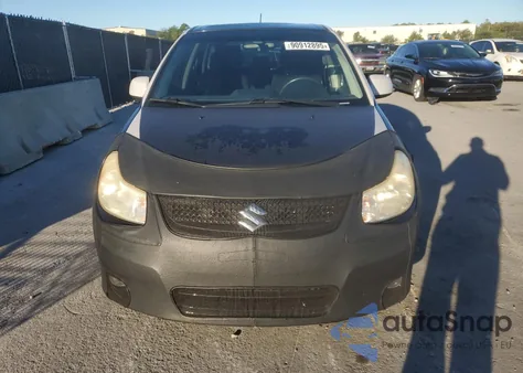 2012 Suzuki Sx4 из США, поврежденный, VIN JS2YA5A57C6300245